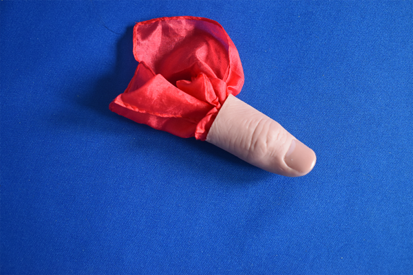 A dummy Thumb Tip with red scarf